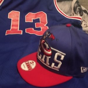 New era snap back hat